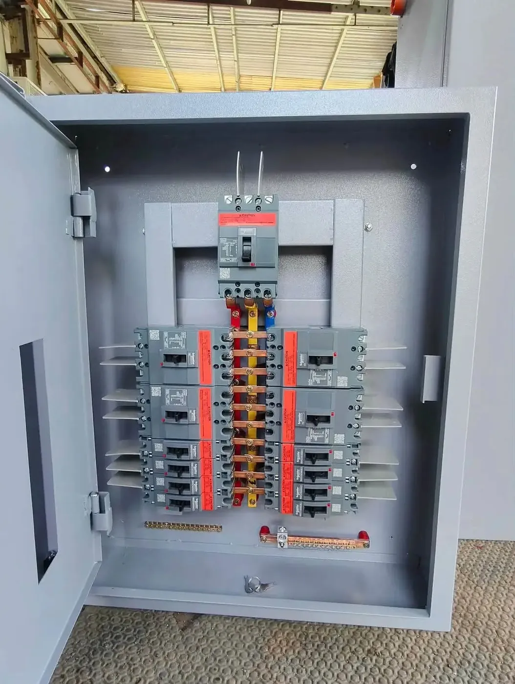 Distribution board: Three-phase board with MCCBs and copper busbars.