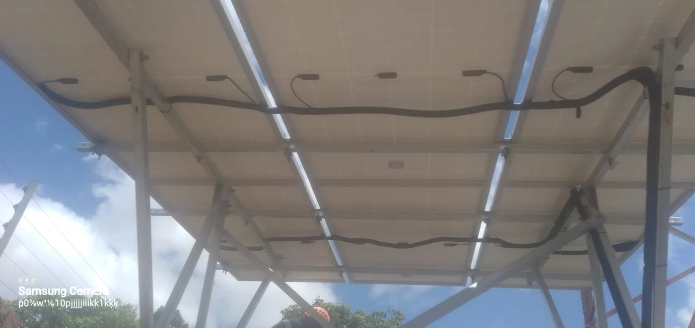 Solar canopy structure: PV mounting and cable-routing detail.